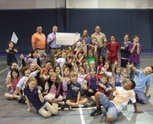 Walmart DC#6008 shows support for Boys and Girls Club of Benton County/Bella Vista Club by providing volunteer time and a $500 donation