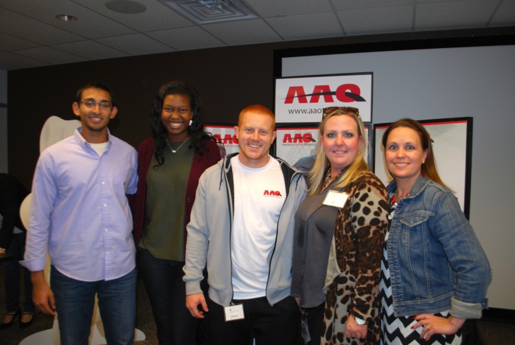 Rishab Dayal and Wynden Williams gather with Arkansas Athletes Outreach representatives Nathan Sadler, Kristi Coats and Gretchen Laffoon